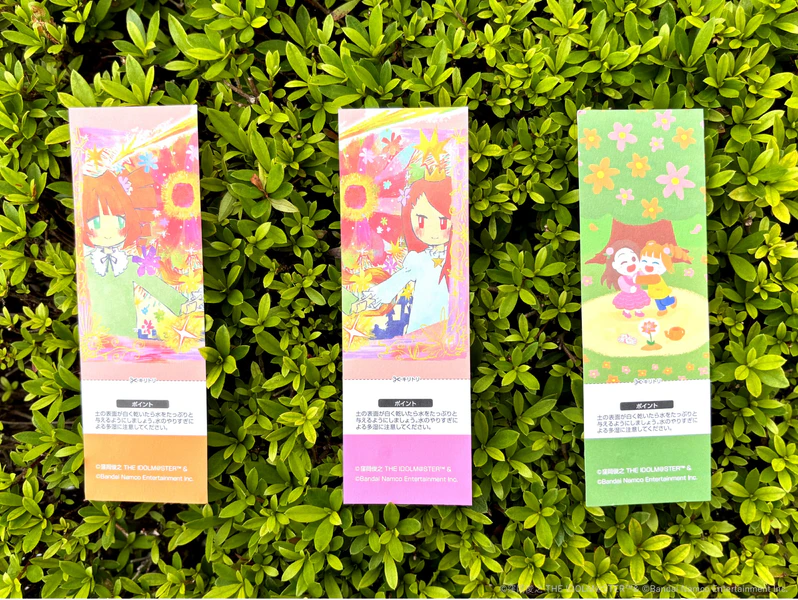 File:Goods 高槻 やよい ・ 水瀬 伊織 twin live いつまでもなかよし! 花种寄语书签.jpg